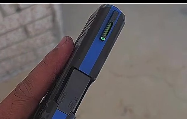 A custom Cerakote pistol with upgraded sights