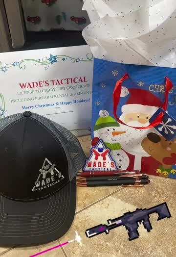 A Wade's Tactical License to Carry gift certificate, branded hat and pens